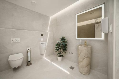 Et badeværelse på Penthouse villa Bianca Vodice