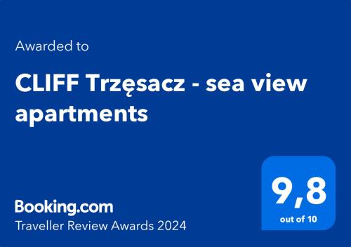 una señal azul que dice transacciones de regalo apartamentos con vistas al mar en CLIFF Trzęsacz - sea view apartments, en Trzęsacz