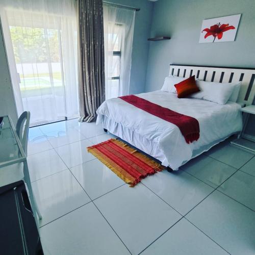Ένα ή περισσότερα κρεβάτια σε δωμάτιο στο Leading Guest Farm