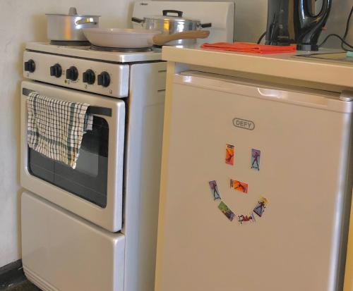 Dapur atau dapur kecil di Sun's spacious apartment