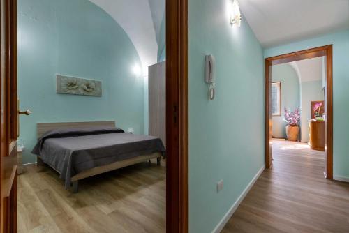 Pio Apartment by BarbarHouse tesisinde bir odada yatak veya yataklar