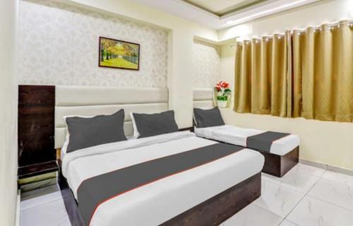 Katil atau katil-katil dalam bilik di Hotel meet palace