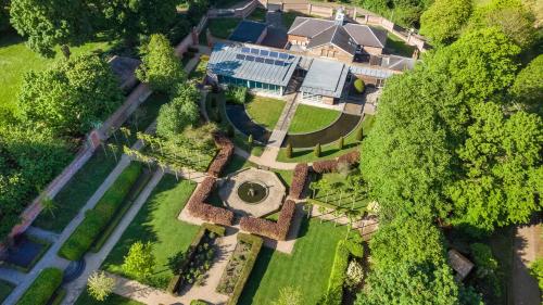 an aerial view of a house with a garden at Luxury 10,000 Sq Ft 7-bed Mansion With Indoor Pool in Sidcup
