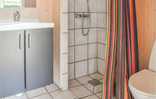 a bathroom with a shower and a sink at Holiday Home Bellevue Sydals Denm in Skovby