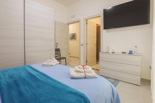 Ein Bett oder Betten in einem Zimmer der Unterkunft BarbyB B&B