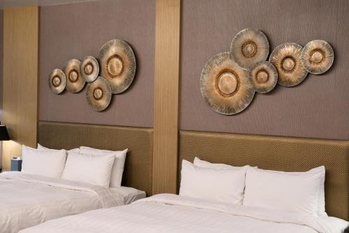 Ein Bett oder Betten in einem Zimmer der Unterkunft Hotel Geight Taipei