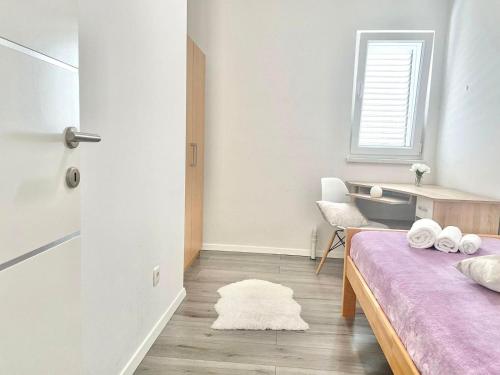 Postel nebo postele na pokoji v ubytování Apartman Niko