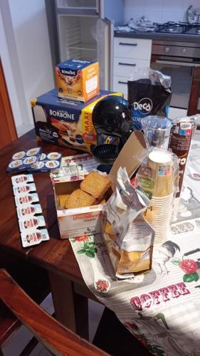 a table with boxes of food on top of it at Casa Dolce Casa in Enna