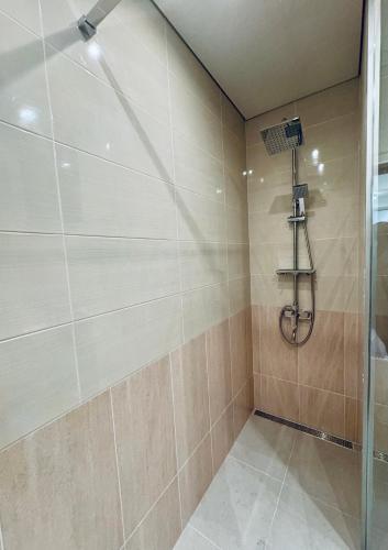 a bathroom with a shower with a glass door at Kharkovlux in Kharkiv