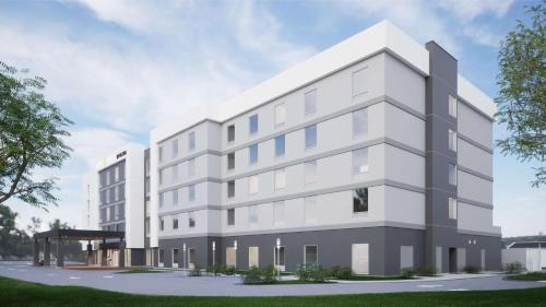 an architectural rendering of a white building at Home2 Suites By Hilton Fort Walton Beach in Fort Walton Beach