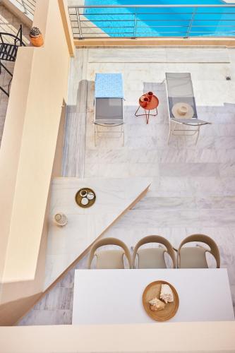 an overhead view of a room with a table and chairs at Athens Riviera Villa in Anavyssos