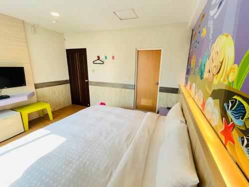 TV a/nebo společenská místnost v ubytování 南天海旅店