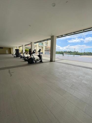 a group of motorcycles parked in a building at J&SM Riverine resort homestay in Kuching