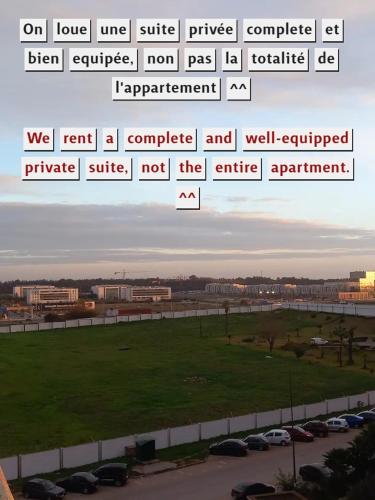 a view of a parking lot with cars in a field at Welcome to Rabat Technopolis, Sala jadida, the book is open, We propose a private suite in a shared apartment, Dears A rab couples you may need a marriage certificate to rent the room According to Moroccan law, Thank you in advance in Oulad Yakoub
