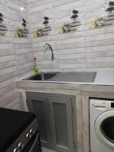 O bucătărie sau chicinetă la Sen Keur TROIS