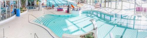 an indoor swimming pool on a cruise ship at A la campagne chez l'habitant in Germainville