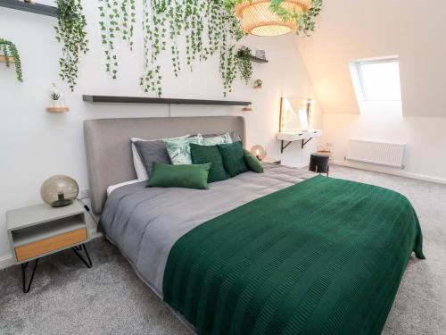 Una cama o camas en una habitación de 20 Bishops Way