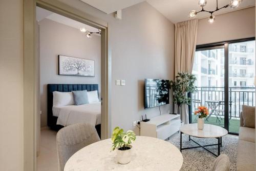 a hotel room with a bed and a balcony at Pool View One Bed Room Business Bay in Dubai