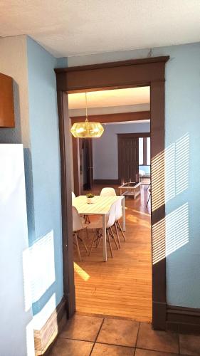 a dining room with a table and a room with a dining room at Ana Maria del Azul in Minneapolis