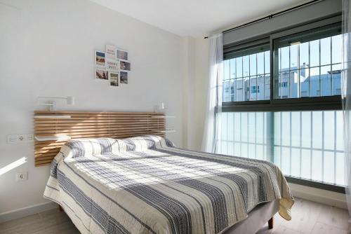 Кровать или кровати в номере Apartamento Coral - Solo familias