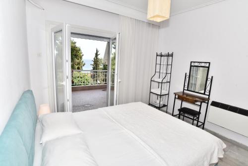 A bed or beds in a room at Luca Apartments