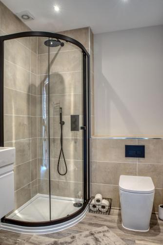 a bathroom with a shower and a toilet at Downs in Blewbury