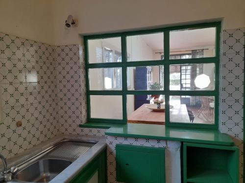 Η κουζίνα ή μικρή κουζίνα στο BB Villa Bolgheri Mare