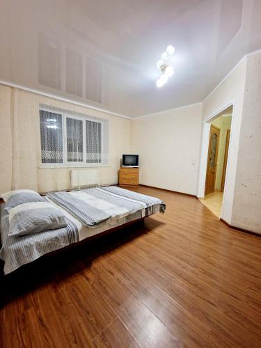 Säng eller sängar i ett rum på Apartment on Chornovola, 44