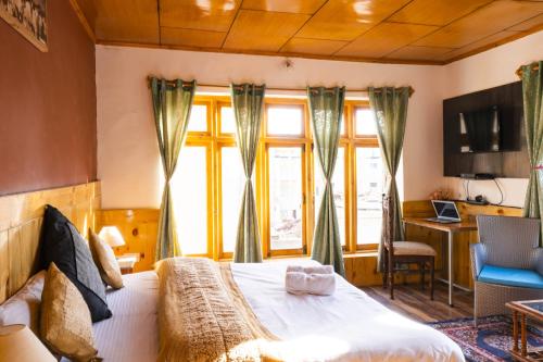 Μια τηλεόραση ή/και κέντρο ψυχαγωγίας στο Rainbow Holiday Home