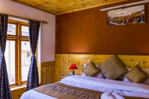 Ένα ή περισσότερα κρεβάτια σε δωμάτιο στο Rainbow Holiday Home
