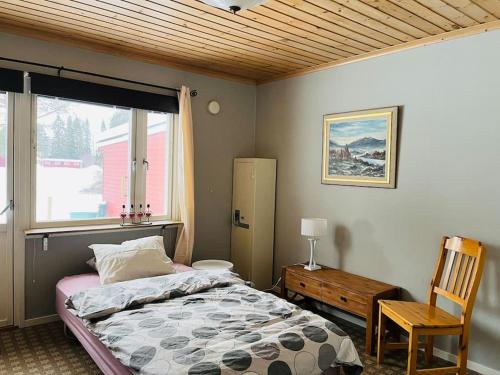 Postelja oz. postelje v sobi nastanitve Vrijstaand huis in Västerbotten