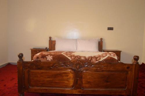 Postel nebo postele na pokoji v ubytování Tililt house