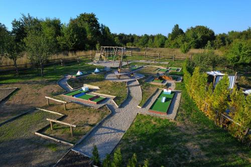an aerial view of a park with a playground at Ethno Houses Plitvice Lakes Hotel in Plitvica selo