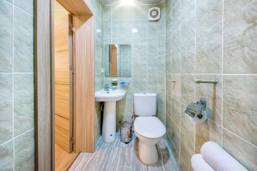 Bilik mandi di Apart Hotel Georgia Gold