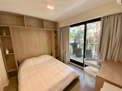 The best Apartment in Cañitas - Buenos Aires tesisinde bir odada yatak veya yataklar