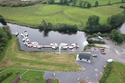 an aerial view of a parking lot next to a lake at Killynick Glamping Oiney Fishing County Fermanagh in Enniskillen