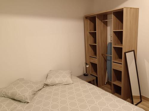 Ένα ή περισσότερα κρεβάτια σε δωμάτιο στο Appartement T2 privé proche gare