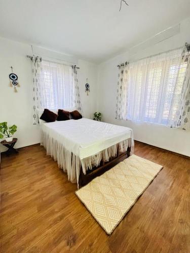 Postel nebo postele na pokoji v ubytování Pearl In Munroe Island