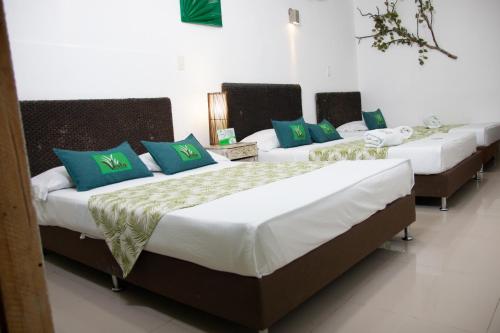 Letto o letti in una camera di Hotel Vesta Boutique