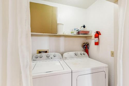 a white washer and dryer in a room at Sea Star #44-B in Buxton