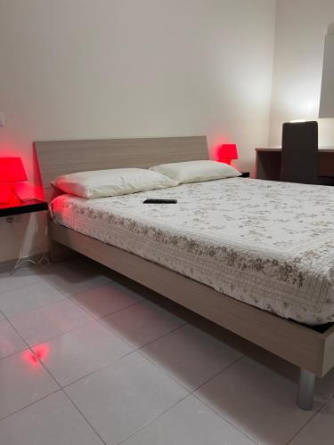 Ένα ή περισσότερα κρεβάτια σε δωμάτιο στο B&B il Tulipano
