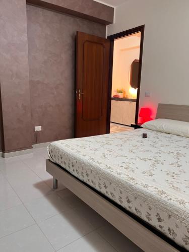 Ένα ή περισσότερα κρεβάτια σε δωμάτιο στο B&B il Tulipano