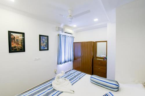 Katil atau katil-katil dalam bilik di 2 Bedroom Apartment in Resort on Candolim Beach