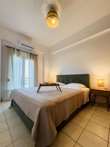 Katil atau katil-katil dalam bilik di Nectar Apartments