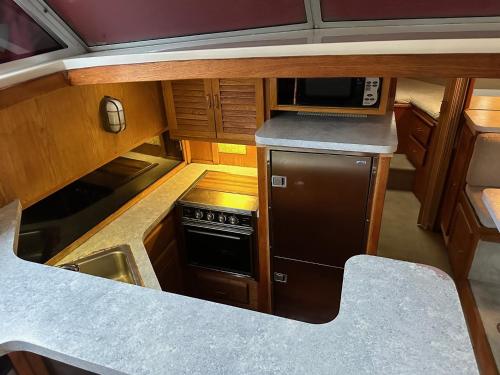 an overhead view of a kitchen in a boat at Annapolis Boat Life - Overnight Stays in Annapolis