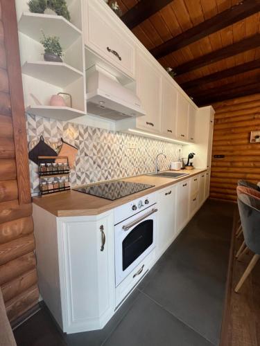Η κουζίνα ή μικρή κουζίνα στο Guest House Recharge