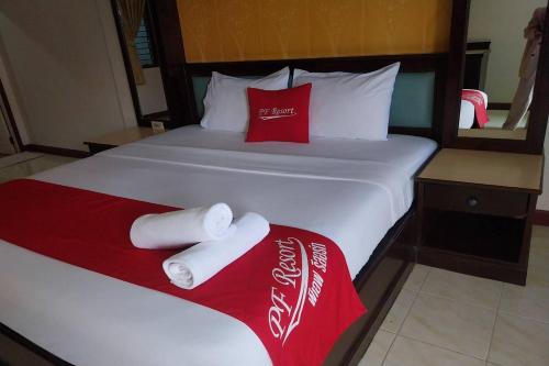 Postel nebo postele na pokoji v ubytování PF Resort