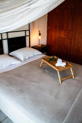 Katil atau katil-katil dalam bilik di Nectar Apartments