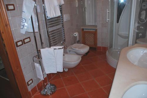 Koupelna v ubytování Hotel De La Poste