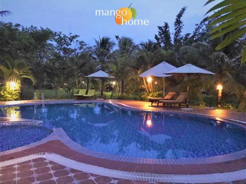 Bazén v ubytování Mango Home Riverside Eco - Resort nebo v jeho okolí